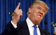 Republican presidential candidate Donald Trump gestures and declares "You're fired!" at a rally in Manchester, New Hampshire, June 17, 2015.  REUTERS/Dominick Reuter      TPX IMAGES OF THE DAY      - RTX1GZCO